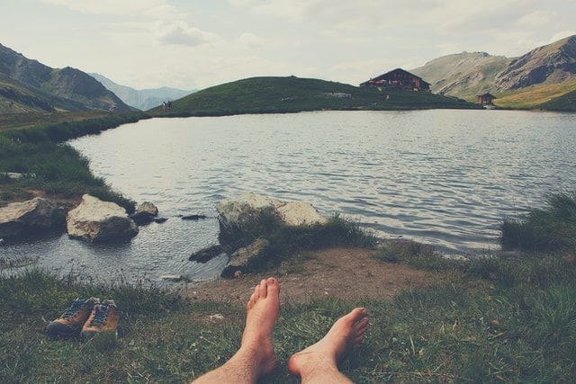 Barefoot person at lake